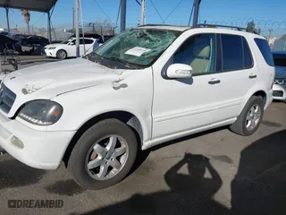 2003 Mercedes-Benz M-Class 5.0L with VIN 4JGAB75E83A425293, listed as a IAAI auction lot 41320199 with NaN miles. Bid and sale history available at carsss.com. Image 17.