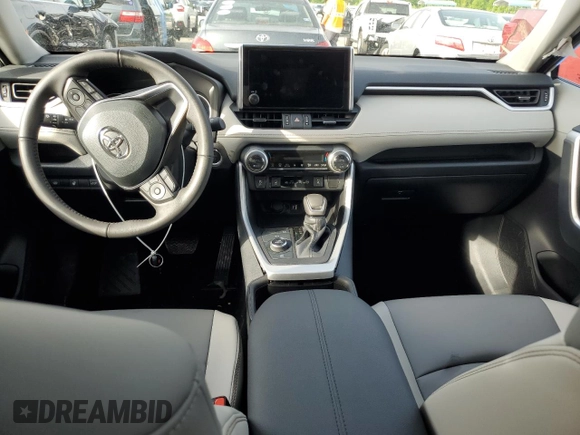 2024 Toyota RAV4 Hybrid XLE Premium with VIN 4T3B6RFV1RU174487, listed as a Copart auction lot 57208645 with 9,911 mi miles and Salvage title. Bid and sale history available at DreamBid. Image 8.