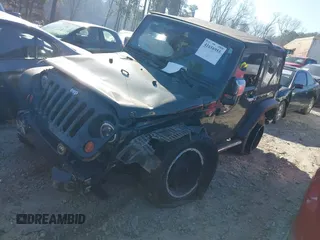 2010 Jeep Wrangler Sport with VIN 1J4AA2D16AL212492, listed as a IAAI auction lot 41656955 with 225,718 mi miles and . Bid and sale history available at carsss.com. Image 16.