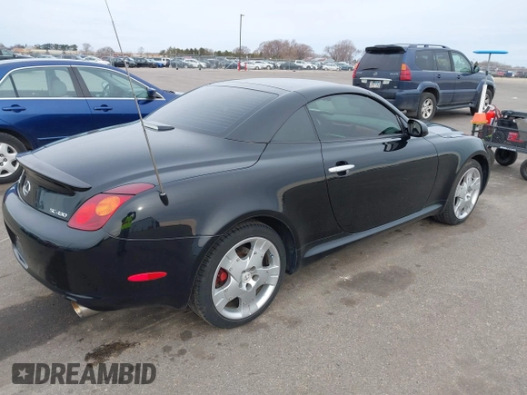 2002 Lexus SC with VIN JTHFN48Y120003925, listed as a IAAI auction lot 41921006 with 157,235 mi miles. Bid and sale history available at carsss.com. Image 4.