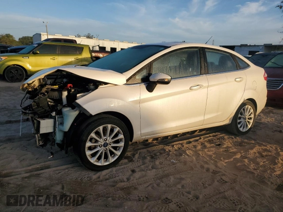 2017 Ford Fiesta Titanium with VIN 3FADP4CJ1HM123863, listed as a Copart auction lot 80270774 with 66,911 mi miles and Salvage Title. Bid and sale history available at DreamBid. Image 1.