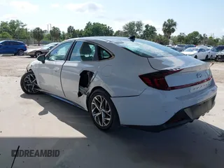 2023 Hyundai Sonata SEL z VIN KMHL64JA0PA280223, wystawiony jako IAAI lot #41996995 z przebiegiem 10 620 mil mil oraz . Historia ofert i sprzedaży dostępna na DreamBid. Obrazek 3.