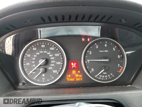 2012 BMW X5 35i with VIN 5UXZV4C57CL765053, listed as a Copart auction lot 59997275 with 157,943 mi miles and Salvage title. Bid and sale history available at DreamBid. Image 9.