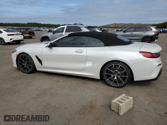 2019 BMW 8 Series M850i xDrive with VIN WBAFY4C54KBX29575, listed as a Copart auction lot 71558594 with 37,627 mi miles and Salvage title. Bid and sale history available at DreamBid. Image 2.