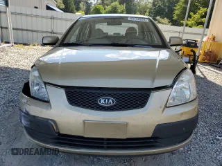 2009 Kia Rio LX with VIN KNADE223996521831, listed as a Copart auction lot 69126284 with 183,796 mi miles and Salvage Title. Bid and sale history available at DreamBid. Image 5.