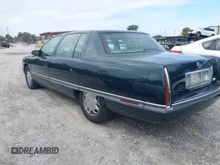 1996 Cadillac DeVille z VIN 1G6KF5298TU269234, wystawiony jako IAAI lot #41345945 z przebiegiem 34 218 mil mil oraz . Historia ofert i sprzedaży dostępna na DreamBid. Obrazek 3.