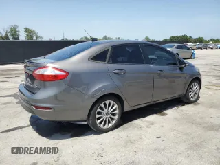 2014 Ford Fiesta SE z VIN 3FADP4BJ4EM110277, wystawiony jako Copart lot #56921115 z przebiegiem 126 536 mil mil oraz Szkoda całkowita • Salvage title. Historia ofert i sprzedaży dostępna na DreamBid. Obrazek 3.