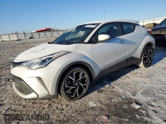 2022 Toyota C-HR XLE with VIN NMTKHMBXXNR143981, listed as a Copart auction lot 42221215 with 52,750 mi miles and Salvage Title. Bid and sale history available at carsss.com. Image 1.