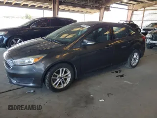 2015 Ford Focus SE z VIN 1FADP3F22FL288043, wystawiony jako Copart lot #63527985 z przebiegiem 39 691 mil mil oraz Czysty tytuł • Clean title. Historia ofert i sprzedaży dostępna na DreamBid. Obrazek 1.