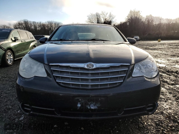 2010 Chrysler Sebring Limited with VIN 1C3CC5FB2AN120496, listed as a Copart auction lot 82131024 with 106,563 mi miles and Salvage Title. Bid and sale history available at carsss.com. Image 5.