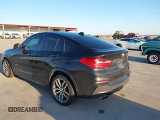 2018 BMW X4 xDrive28i with VIN 5UXXW3C59J0T80560, listed as a IAAI auction lot 41734915 with 122,850 mi miles. Bid and sale history available at carsss.com. Image 3.
