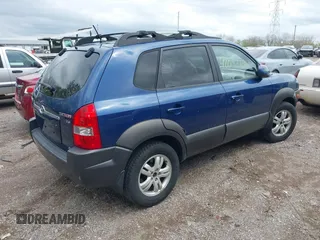 2006 Hyundai Tucson GLS with VIN KM8JN72D36U409525, listed as a IAAI auction lot 42082119 with 142,163 mi miles. Bid and sale history available at carsss.com. Image 4.