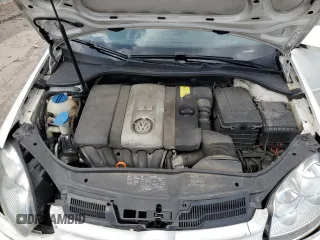 2009 Volkswagen Rabbit S with VIN WVWDB71K79W085935, listed as a Copart auction lot 60697594 with 102,780 mi miles and Salvage title. Bid and sale history available at DreamBid. Image 11.