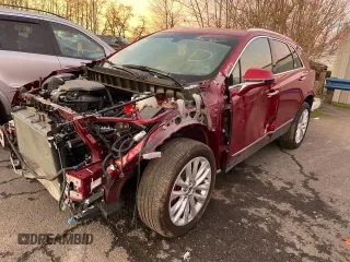 2019 Cadillac XT5 Premium Luxury AWD with VIN 1GYKNFRS2KZ251595, listed as a Copart auction lot 76847104 with 23,925 mi miles and Salvage title. Bid and sale history available at DreamBid. Image 2.
