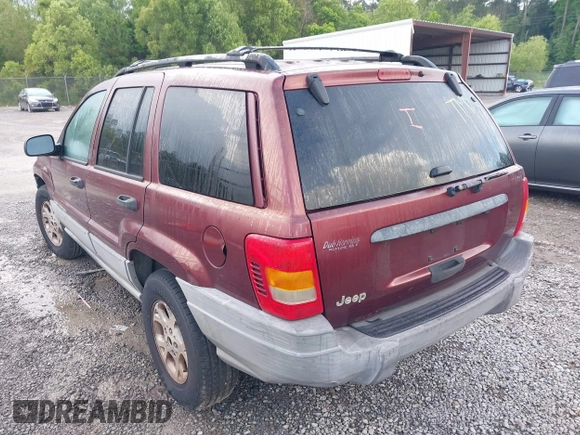 2000 Jeep Grand Cherokee Laredo with VIN 1J4G248S0YC351033, listed as a IAAI auction lot 42165830 with 145,351 mi miles and . Bid and sale history available at DreamBid. Image 6.