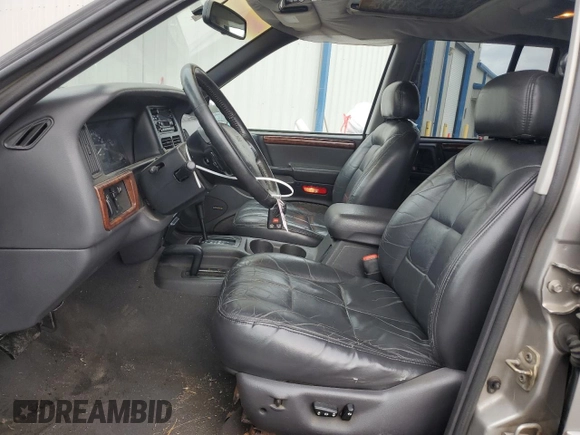 1997 Jeep Grand Cherokee Limited with VIN 1J4GZ78Y0VC682949, listed as a Copart auction lot 82152424 with 194,576 mi miles and Salvage Title. Bid and sale history available at carsss.com. Image 7.