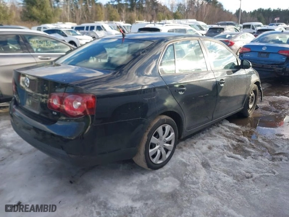 2009 Volkswagen Jetta Sedan S with VIN 3VWJZ71K29M082792, listed as a IAAI auction lot 41682882 with 109,699 mi miles. Bid and sale history available at carsss.com. Image 4.