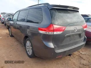2013 Toyota Sienna XLE with VIN 5TDDK3DC6DS054942, listed as a IAAI auction lot 41172005 with 202,675 mi miles and . Bid and sale history available at DreamBid. Image 3.