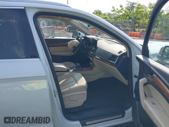 2021 Audi Q5 Premium Plus z VIN WA1BAAFYXM2050028, wystawiony jako IAAI lot #42479898 z przebiegiem 39 015 mil mil oraz . Historia ofert i sprzedaży dostępna na DreamBid. Obrazek 5.
