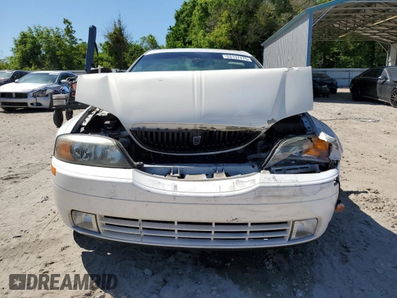 2001 Lincoln LS Sport with VIN 1LNHM87A31Y634664, listed as a Copart auction lot 53137475 with 120,072 mi miles and Salvage Title. Bid and sale history available at DreamBid. Image 5.