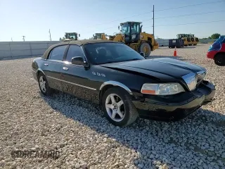 2006 Lincoln Town Car Signature z VIN 1LNHM81V96Y633439, wystawiony jako Copart lot #56548985 z przebiegiem 146 823 mil mil oraz Szkody całkowita. Historia ofert i sprzedaży dostępna na DreamBid. Obrazek 13.
