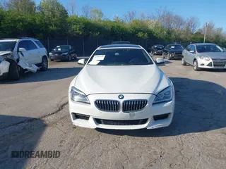 2016 BMW 6 Series 640i xDrive with VIN WBA6D2C51GGT66209, listed as a IAAI auction lot 42064405 with 113,500 mi miles and . Bid and sale history available at carsss.com. Image 13.