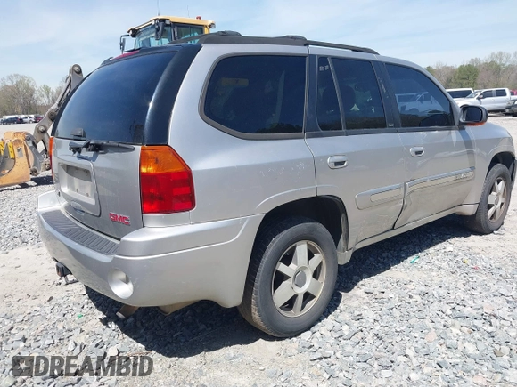 2005 GMC Envoy SLE with VIN 1GKDS13S652390259, listed as a IAAI auction lot 41825258 with 162,172 mi miles and . Bid and sale history available at DreamBid. Image 4.