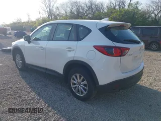 2016 Mazda CX-5 Sport with VIN JM3KE2BY2G0819604, listed as a IAAI auction lot 42059846 with 124,911 mi miles. Bid and sale history available at carsss.com. Image 3.