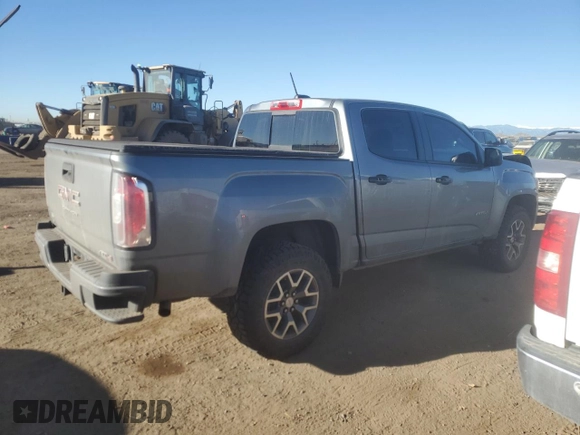 2022 GMC Canyon 4WD AT4 w/Leather with VIN 1GTG6FEN2N1287329, listed as a Copart auction lot 46471595 with 38,694 mi miles and Salvage Title. Bid and sale history available at carsss.com. Image 3.