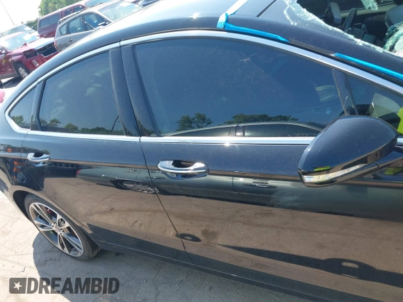 2017 Ford Fusion Titanium with VIN 3FA6P0K9XHR117300, listed as a IAAI auction lot 42731703 with 47,276 mi miles and . Bid and sale history available at DreamBid. Image 13.