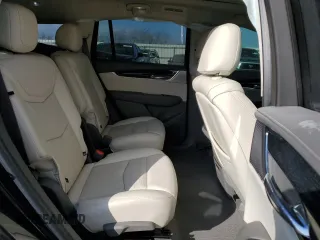 2021 Cadillac XT6 Premium Luxury z VIN 1GYKPCRS6MZ205831, wystawiony jako Copart lot #47259215 z przebiegiem 31 959 mil mil oraz Szkody całkowita. Historia ofert i sprzedaży dostępna na DreamBid. Obrazek 11.