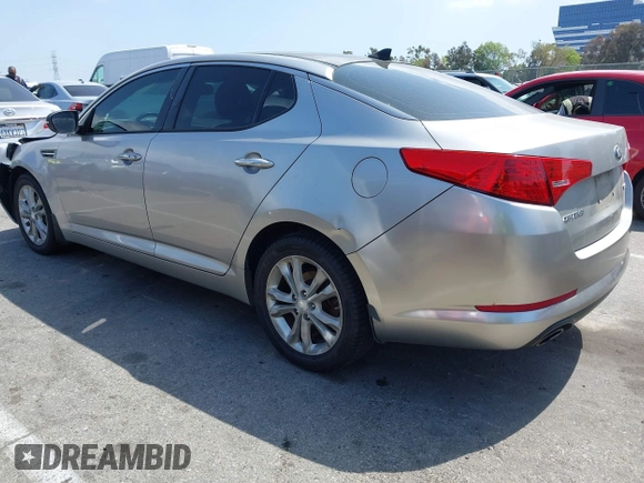 2013 Kia Optima EX z VIN 5XXGN4A70DG148060, wystawiony jako IAAI lot #41900134 z przebiegiem 149 214 mil mil oraz . Historia ofert i sprzedaży dostępna na DreamBid. Obrazek 3.