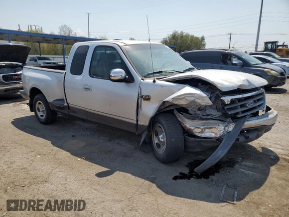 2001 Ford F-150 XL with VIN 1FTRX07L71KA57207, listed as a Copart auction lot 64843825 with Not provided miles and Salvage title. Bid and sale history available at DreamBid. Image 4.