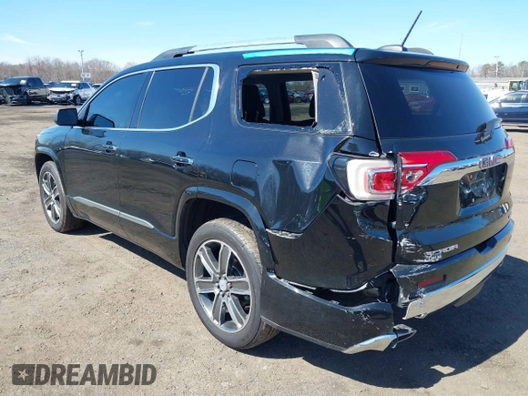 2017 GMC Acadia Denali with VIN 1GKKNXLS5HZ317557, listed as a IAAI auction lot 41813237 with 85,943 mi miles and . Bid and sale history available at carsss.com. Image 6.