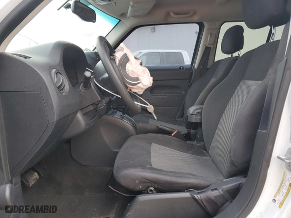 2015 Jeep Patriot Altitude Edition with VIN 1C4NJPBA7FD350826, listed as a Copart auction lot 85614974 with 203,447 mi miles and Salvage Title. Bid and sale history available at carsss.com. Image 7.