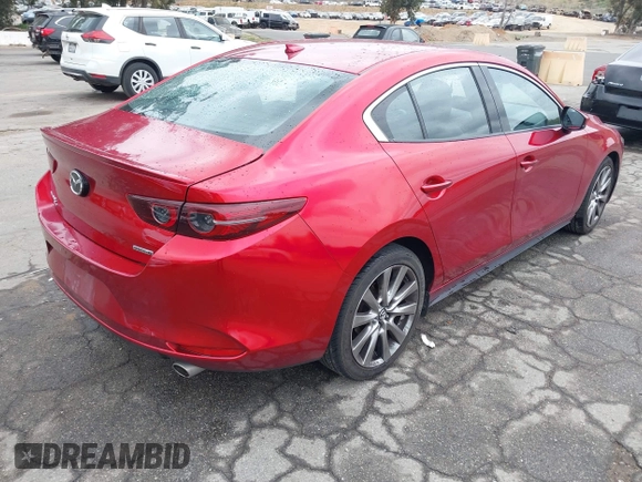 2021 Mazda 3 with VIN JM1BPBDL6M1305765, listed as a IAAI auction lot 42063684 with 61,011 mi miles and . Bid and sale history available at DreamBid. Image 4.