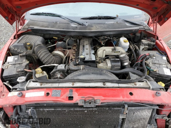2001 Dodge 2500 z VIN 1B7KC23631J508406, wystawiony jako Copart lot #49870715 z przebiegiem 183 868 mil mil oraz Szkoda całkowita • Salvage title. Historia ofert i sprzedaży dostępna na DreamBid. Obrazek 13.