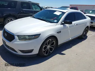 2013 Ford Taurus SHO with VIN 1FAHP2KT7DG164494, listed as a IAAI auction lot 42360569 with 206,089 mi miles and . Bid and sale history available at DreamBid. Image 2.