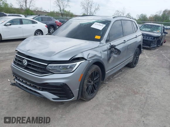 2022 Volkswagen Tiguan SE R-Line Black с VIN 3VVCB7AX1NM065960, выставлен на аукционе IAAI как лот 42149626 с пробегом 71 698 миль миль и . История ставок и продаж доступна на DreamBid. Изображение 17.
