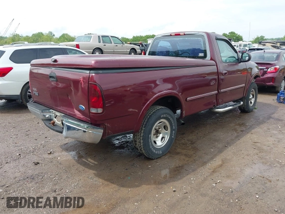 1997 Ford F-150 with VIN 1FTDF18W3VNA43627, listed as a IAAI auction lot 42132799 with 180,493 mi miles and . Bid and sale history available at DreamBid. Image 4.