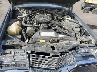 1985 Cadillac Eldorado z VIN 1G6EL5786FE628861, wystawiony jako Copart lot #76372384 z przebiegiem 15 146 mil mil oraz Szkody całkowita. Historia ofert i sprzedaży dostępna na DreamBid. Obrazek 13.