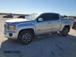 2016 GMC Canyon 4WD SLE with VIN 1GTG6CE38G1180642, listed as a Copart auction lot 87490464 with 117,074 mi miles and Salvage Title. Bid and sale history available at carsss.com. Image 1.