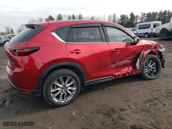 2021 Mazda CX-5 Grand Touring with VIN JM3KFBDM2M0434594, listed as a Copart auction lot 43135775 with 33,736 mi miles and Salvage Title. Bid and sale history available at carsss.com. Image 3.