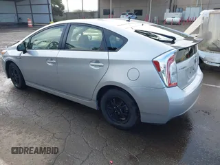 2015 Toyota Prius Four with VIN JTDKN3DUXF0482915, listed as a IAAI auction lot 41827372 with 125,830 mi miles. Bid and sale history available at carsss.com. Image 3.