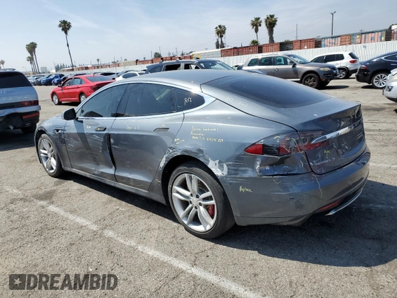 2014 Tesla Model S 60 z VIN 5YJSA1H17EFP36595, wystawiony jako Copart lot #53705035 z przebiegiem 148 254 mil mil oraz Szkoda całkowita • Salvage title. Historia ofert i sprzedaży dostępna na DreamBid. Obrazek 2.
