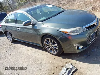 2014 Toyota Avalon Limited z VIN 4T1BK1EB0EU118032, wystawiony jako IAAI lot #41864586 z przebiegiem 72 477 mil mil oraz . Historia ofert i sprzedaży dostępna na DreamBid. Obrazek 1.