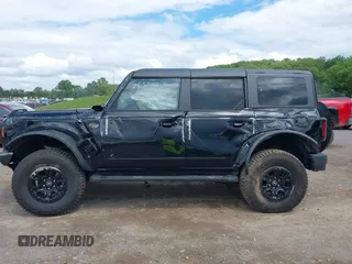 2024 Ford Bronco Wildtrak with VIN 1FMEE2BP1RLA75293, listed as a IAAI auction lot 42199529 with 6,466 mi miles and . Bid and sale history available at DreamBid. Image 14.