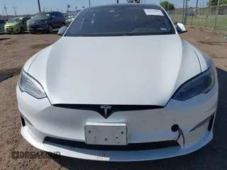 2022 Tesla Model S z VIN 5YJSA1E59NF470813, wystawiony jako IAAI lot #41935297 z przebiegiem Nie podano mil oraz . Historia ofert i sprzedaży dostępna na DreamBid. Obrazek 6.