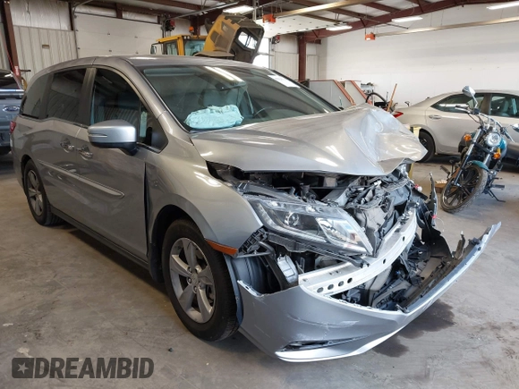 2018 Honda Odyssey EX-L z VIN 5FNRL6H70JB059653, wystawiony jako IAAI lot #42324330 z przebiegiem 115 623 mil mil oraz . Historia ofert i sprzedaży dostępna na DreamBid. Obrazek 1.