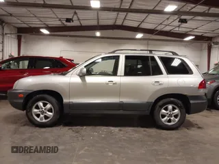 2005 Hyundai Santa Fe GLS with VIN KM8SC73D95U974594, listed as a IAAI auction lot 42340827 with 126,081 mi miles and . Bid and sale history available at DreamBid. Image 14.